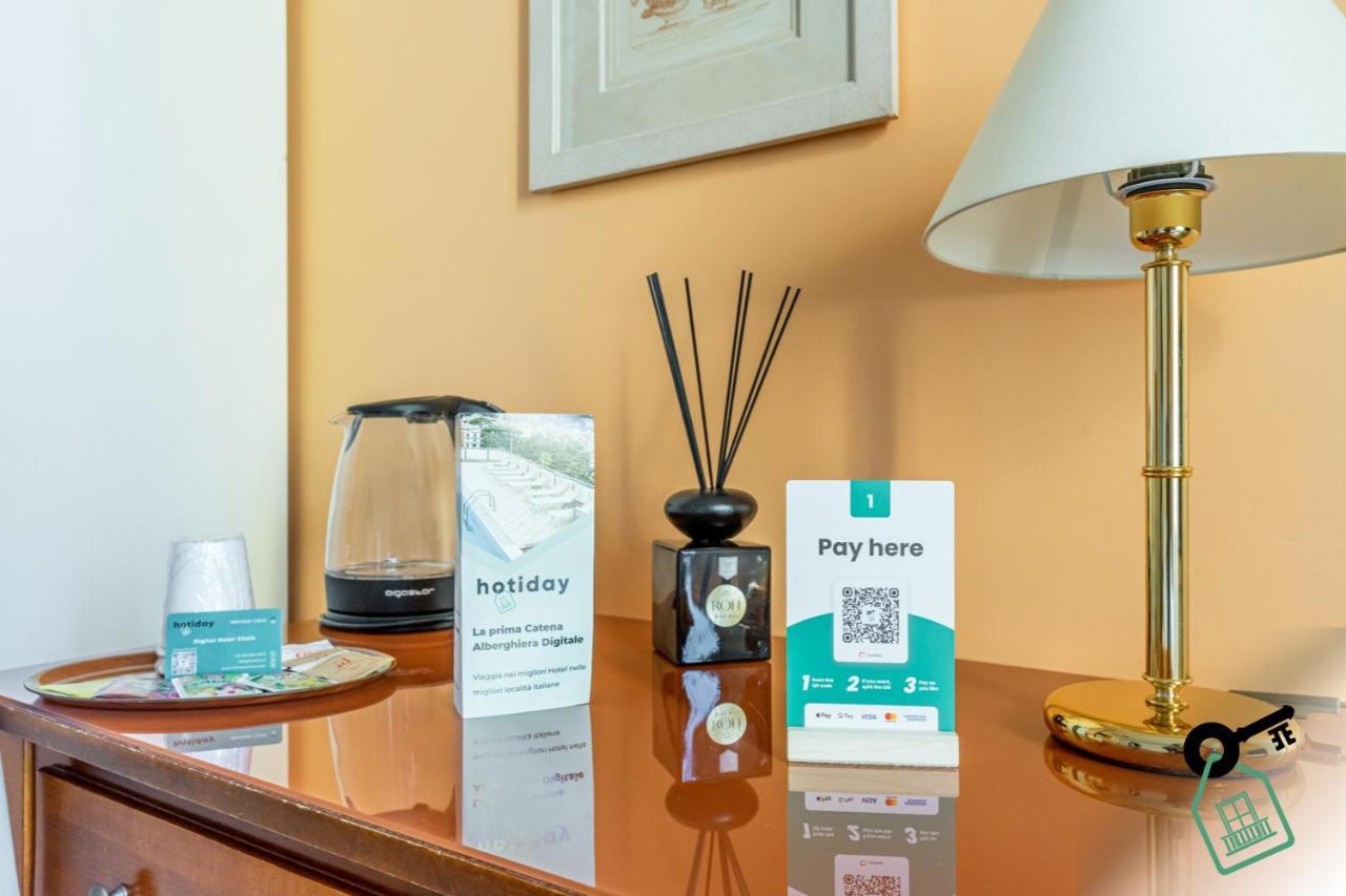 Hotel Rooms Lago Maggiore แวร์บาเนีย ภายนอก รูปภาพ